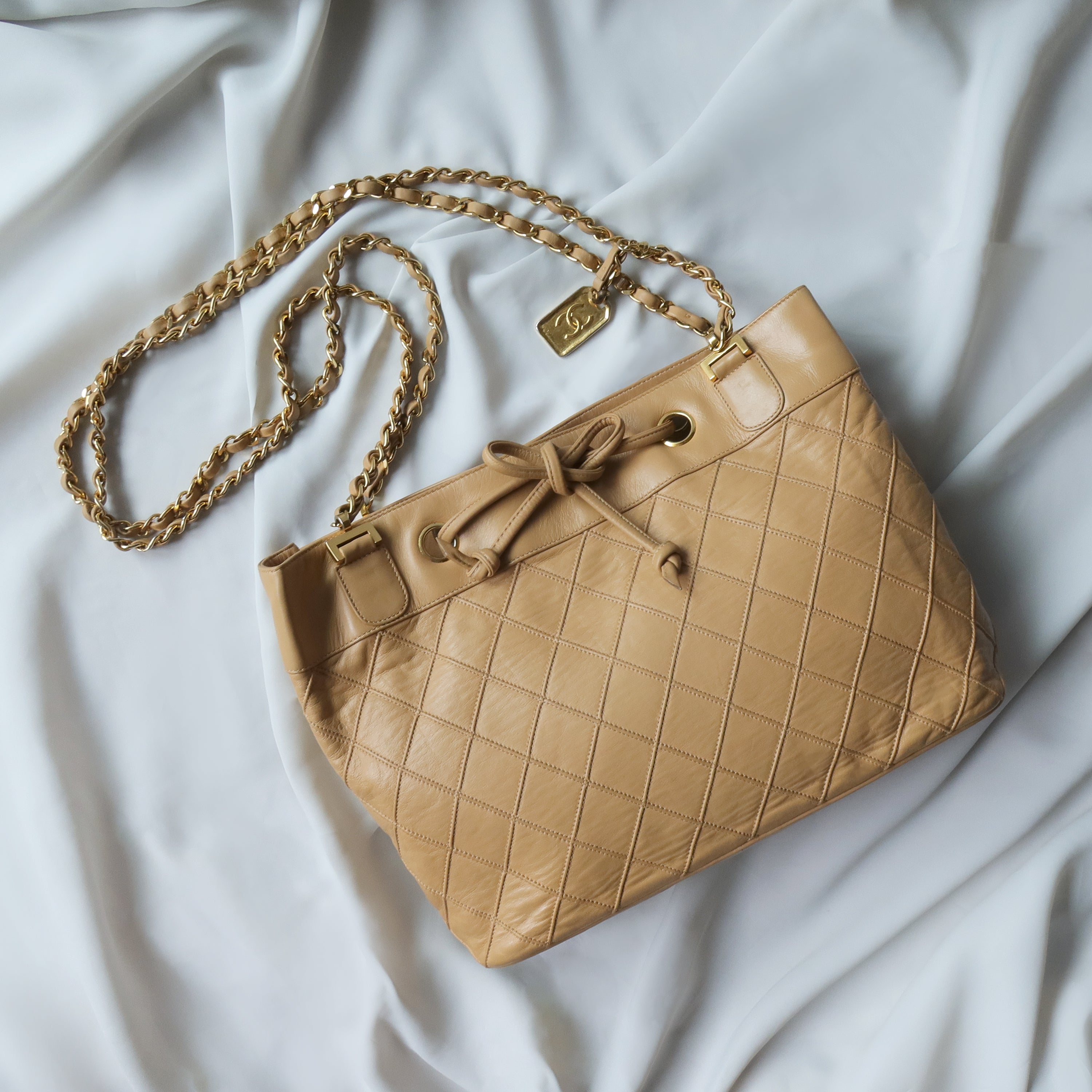 Túi Chanel 22 Small Handbag lighrt nâu logo vàng da bê 34cm best quality