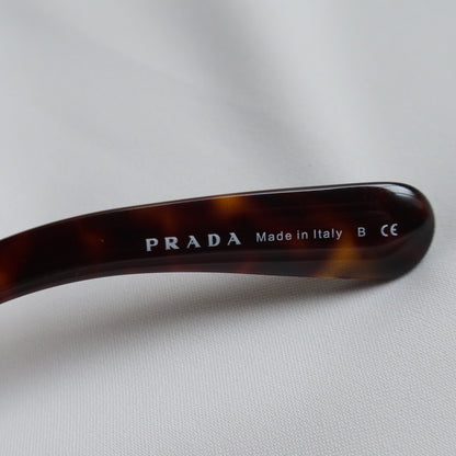 Prada Women Baroque Swirl Round Sunglasses in Havana Brown
